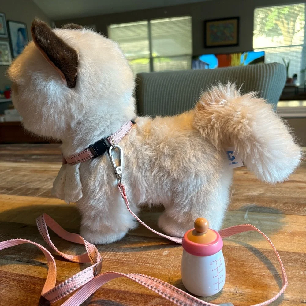 Battery powered Cat Toy that walks, miaus/talks, drinks milk and shakes tail.